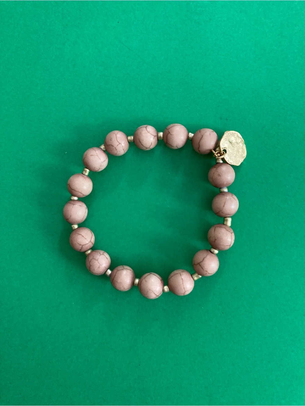 Stone Beaded Stretch Bracelet with Gold Color Hammered Charm